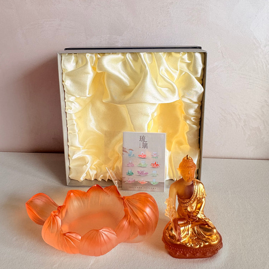 Lotus Serenity · Amber-Toned Liuli Buddha Sculpture with Lotus Base