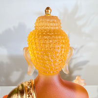 Lotus Serenity · Amber-Toned Liuli Buddha Sculpture with Lotus Base